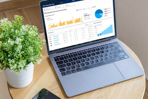 Image of laptop with Amazon Analytics and Reporting on screen