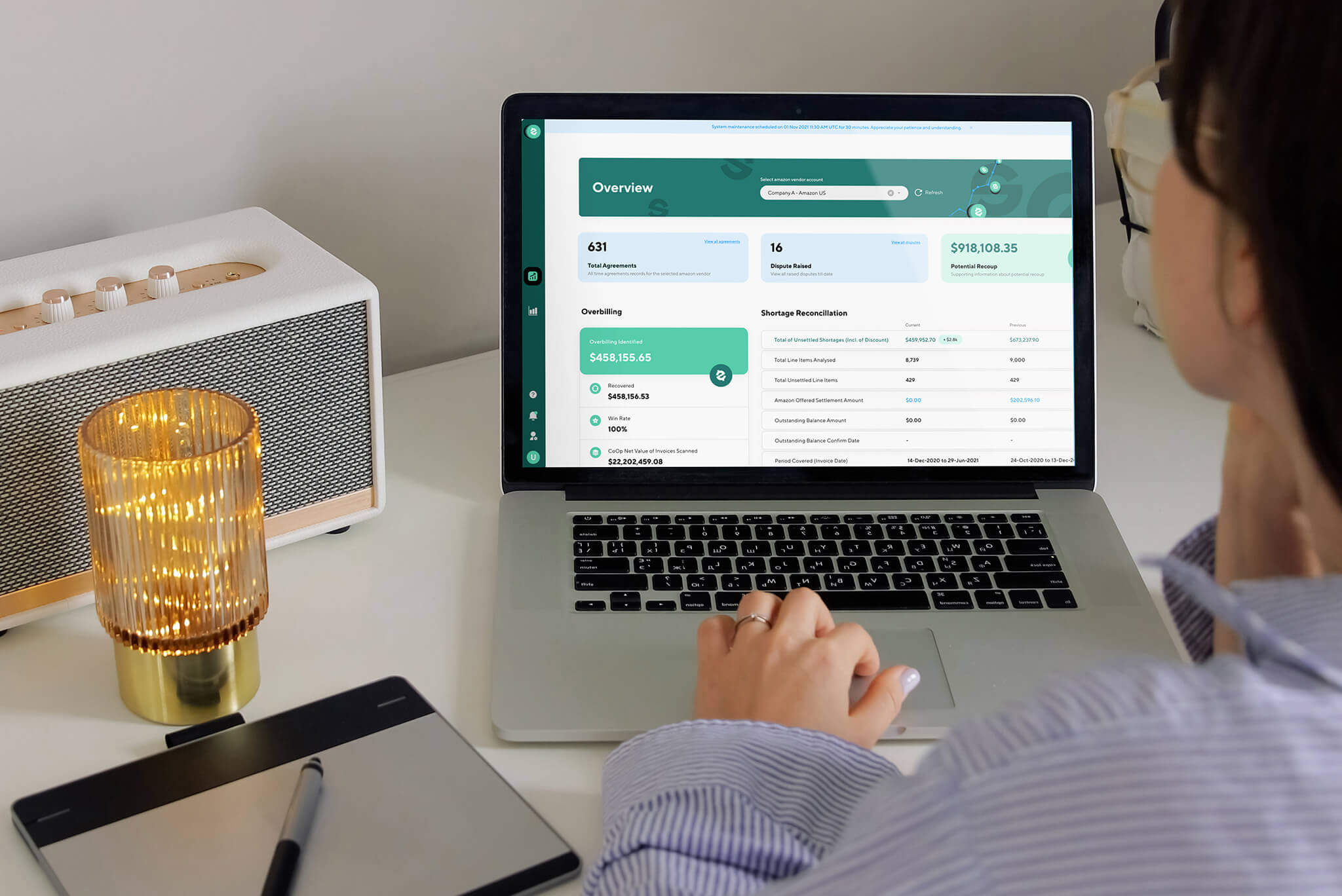 Person reviewing chargeback recovery dashboard with shortage reconciliation and payment metrics on laptop screen.
