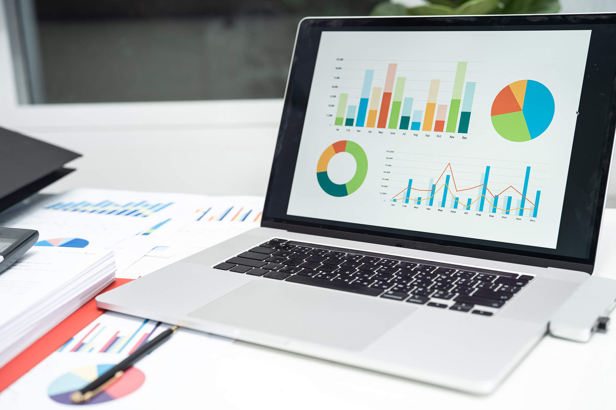 Graph data in project in laptop computer in office to analyzing