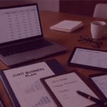 Amazon Vendor Negotiation Strategy Planning – Venture Forge - Venture Forge Laptop and tablet displaying Amazon Vendor Central dashboards with joint business planning documents and performance data.