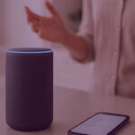 Amazon Alexa Voice Commerce – Venture Forge - Venture Forge Amazon Alexa smart speaker and smartphone on kitchen counter, representing the rise of voice commerce and smart shopping.