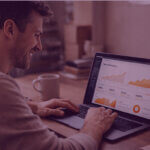 Business owner reviewing strong sales performance on a laptop during an Amazon deal event