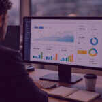 Amazon Interactive Canvas Experience Dashboard - Venture Forge Business professional viewing a performance dashboard on a desktop monitor in a modern office workspace